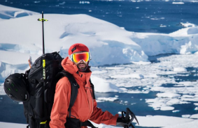 Adventure filmmaker capturing footage in extreme cold environment