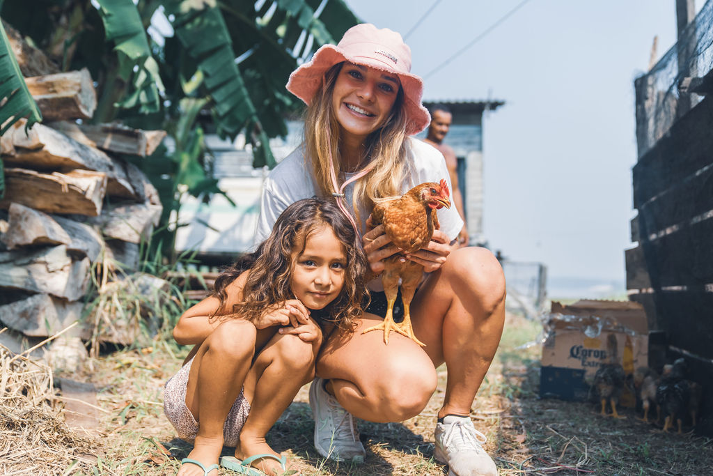 Expedition team navigating the Amazon, surrounded by lush jungle.