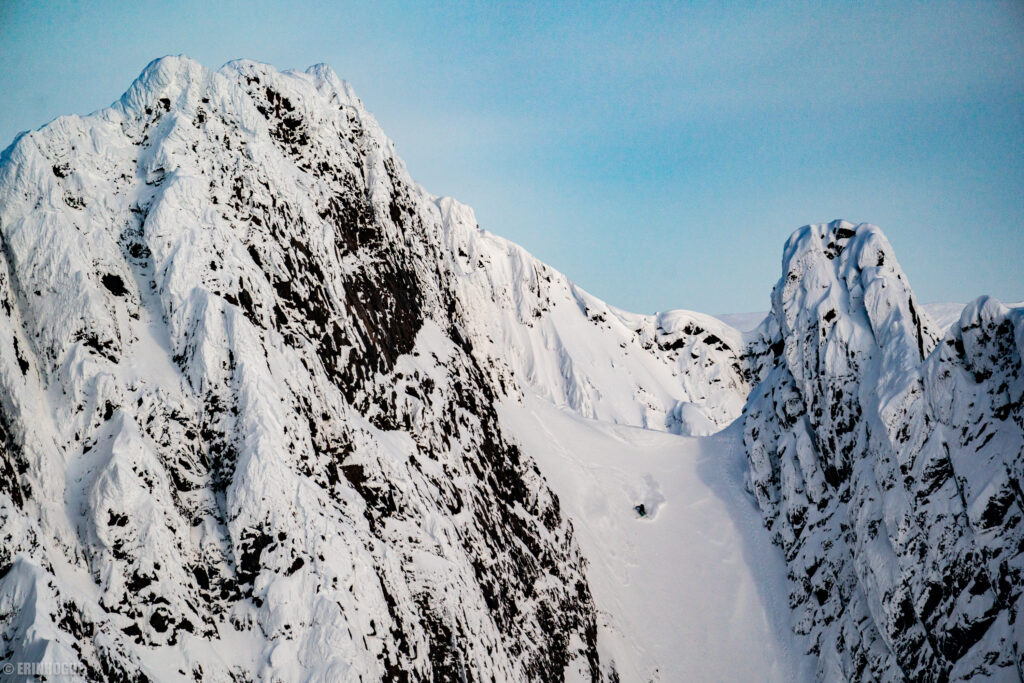 A lone figure navigating the Arctic, encapsulating isolation and resilience