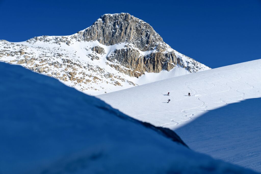 Group of skiers posing together during the Greenland Ski & Sail expedition.