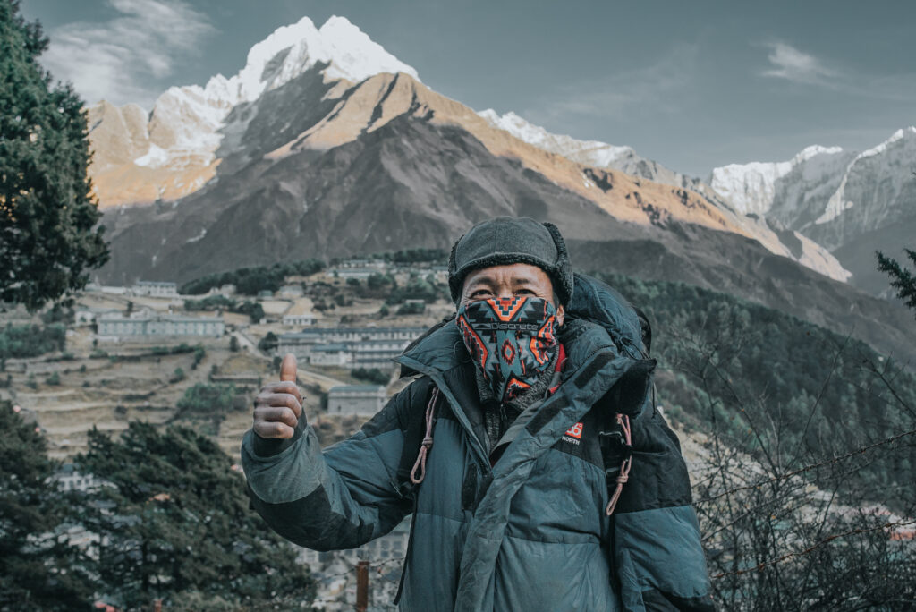 Snow-covered mountain landscape under a clear sky.