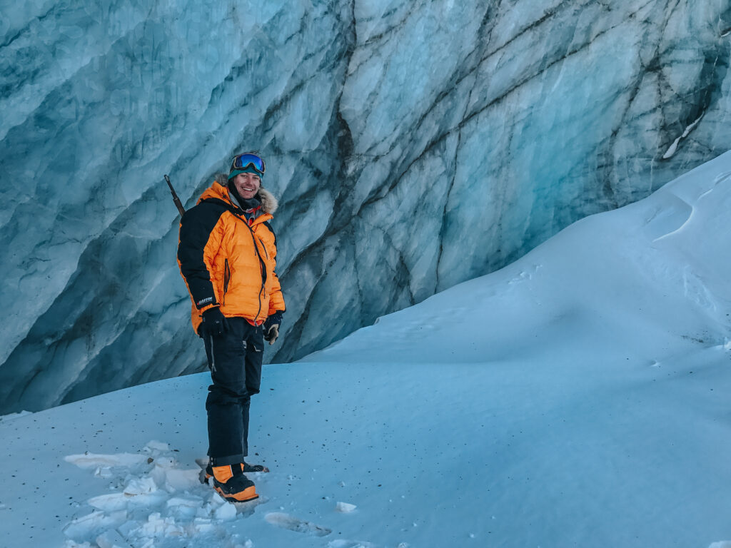 Arctic scenery in Svalbard featuring icy landscapes and rugged terrain.