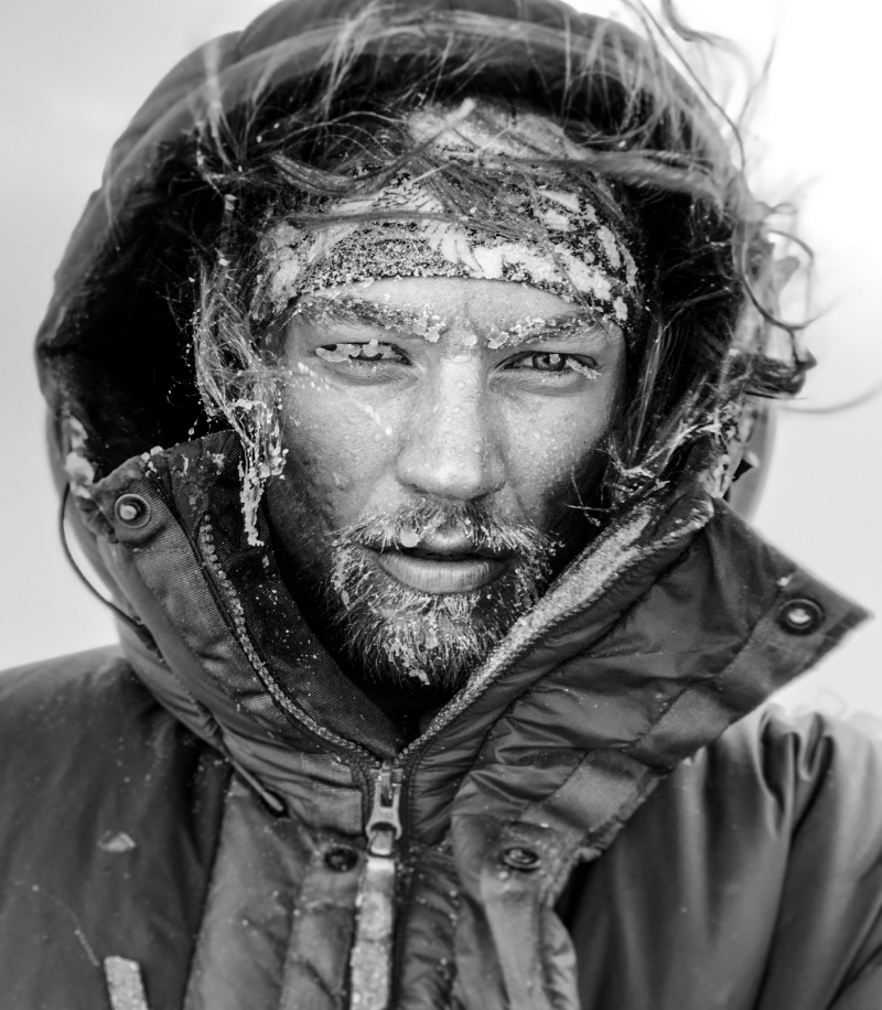 Stein Retzlaff, a man with a beard, has snow covering his face, highlighting a cold, wintry environment