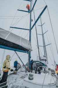 Stein Retzlaff filming aboard the Pangaea vessel in icy conditions